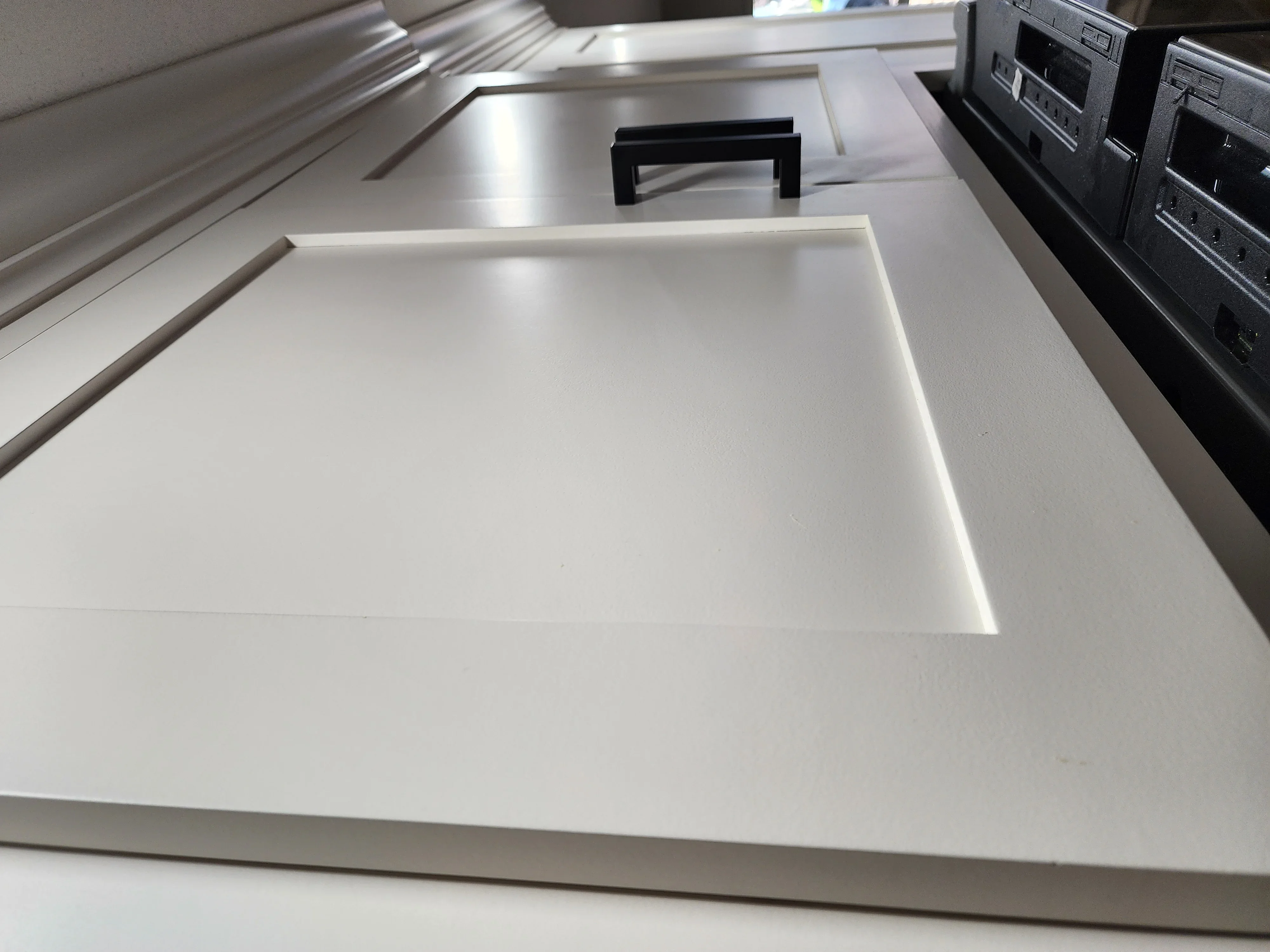 White quartz countertop with undermount sink cutout and polished edge detail